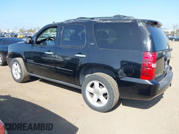 2007 Chevrolet Tahoe LTZ with VIN 1GNFC13087R389132, listed as a IAAI auction lot 42057161 with 191,673 mi miles and . Bid and sale history available at DreamBid. Image 3.
