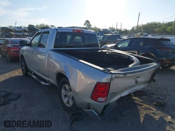 2018 Ram 1500 SLT with VIN 1C6RR6GG2JS119281, listed as a IAAI auction lot 41897492 with 242,877 mi miles and . Bid and sale history available at DreamBid. Image 3.