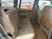 1993 Chevrolet Blazer z VIN 1GNDT13W2P2111444, wystawiony jako Copart lot #61199575 z przebiegiem 177 604 mil mil oraz Czysty tytuł • Clean title. Historia ofert i sprzedaży dostępna na DreamBid. Obrazek 11.