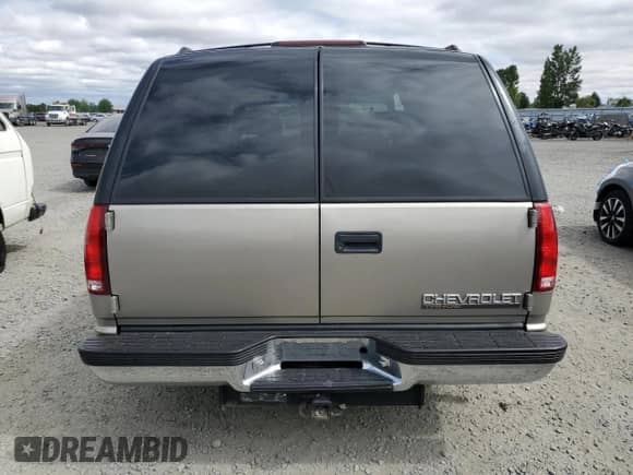 1999 Chevrolet Tahoe with VIN 1GNEC13R0XJ546712, listed as a Copart auction lot 62722745 with 108,864 mi miles and Salvage title. Bid and sale history available at DreamBid. Image 6.