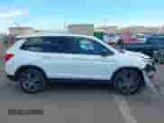 2021 Honda Passport EX-L with VIN 5FNYF7H59MB001083, listed as a IAAI auction lot 42943781 with 56,549 mi miles and . Bid and sale history available at DreamBid. Image 13.