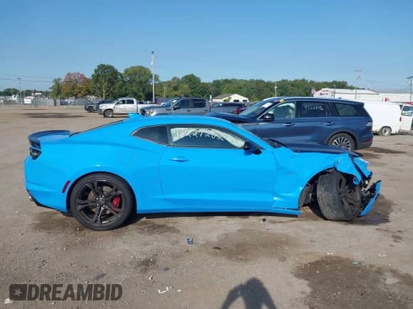 2022 Chevrolet Camaro LT1 z VIN 1G1FE1R7XN0117019, wystawiony jako IAAI lot #43227282 z przebiegiem 7 252 mil mil oraz . Historia ofert i sprzedaży dostępna na DreamBid. Obrazek 14.