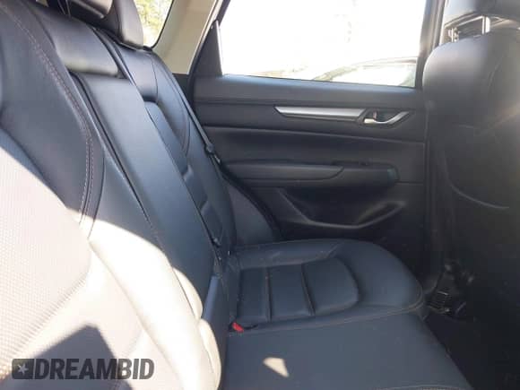 2022 Mazda CX-5 S Carbon Edition z VIN JM3KFBCM7N0613314, wystawiony jako IAAI lot #41889493 z przebiegiem 33 027 mil mil oraz . Historia ofert i sprzedaży dostępna na DreamBid. Obrazek 8.