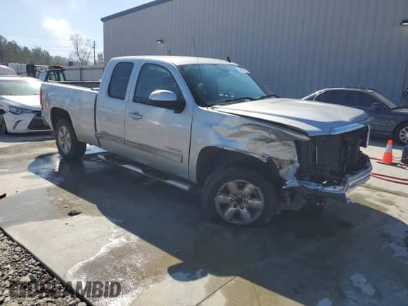 2010 GMC Sierra 1500 with VIN 1GTSCWE04AZ221013, listed as a Copart auction lot 46502985 with 232,338 mi miles and Salvage title. Bid and sale history available at DreamBid. Image 4.
