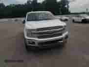 2018 Ford F-150 XL z VIN 1FTFW1EG5JKF26084, wystawiony jako Copart lot #69761295 z przebiegiem Nie podano mil oraz Szkoda całkowita • Salvage title. Historia ofert i sprzedaży dostępna na DreamBid. Obrazek 13.