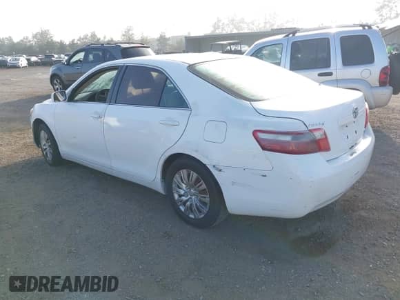 2007 Toyota Camry CE with VIN 4T1BE46K57U711802, listed as a IAAI auction lot 42532733 with 241,411 mi miles and . Bid and sale history available at DreamBid. Image 3.