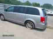 2020 Dodge Grand Caravan SXT with VIN 2C4RDGCGXLR160961, listed as a IAAI auction lot 42891500 with 125,048 mi miles and . Bid and sale history available at DreamBid. Image 3.