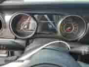 2023 Jeep Wrangler Willys Sport z VIN 1C4HJXDG9PW548960, wystawiony jako Copart lot #67584315 z przebiegiem 14 633 mil mil oraz Szkoda całkowita • Salvage title. Historia ofert i sprzedaży dostępna na DreamBid. Obrazek 9.