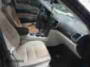 2017 Jeep Grand Cherokee Summit with VIN 1C4RJFJTXHC672075, listed as a IAAI auction lot 41597370 with 136,659 mi miles and . Bid and sale history available at DreamBid. Image 5.