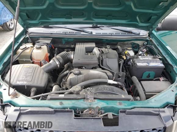 2012 Chevrolet Colorado z VIN 1GCGTBFE7C8157485, wystawiony jako Copart lot #74065504 z przebiegiem 122 185 mil mil oraz Czysty tytuł • Clean title. Historia ofert i sprzedaży dostępna na DreamBid. Obrazek 11.