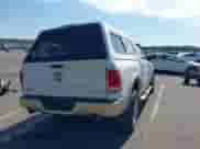 2014 Ram 1500 Longhorn z VIN 1C6RR7PT7ES368846, wystawiony jako IAAI lot #43137351 z przebiegiem 142 136 mil mil oraz . Historia ofert i sprzedaży dostępna na DreamBid. Obrazek 4.