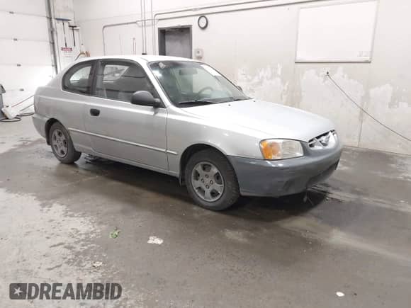2002 Hyundai Accent GS z VIN KMHCG35C12U233289, wystawiony jako IAAI lot #42773414 z przebiegiem 136 371 mil mil oraz . Historia ofert i sprzedaży dostępna na DreamBid. Obrazek 1.