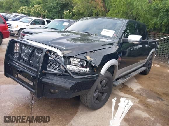2014 Ram 1500 Laramie z VIN 1C6RR7NM7ES353887, wystawiony jako IAAI lot #42349659 z przebiegiem 206 055 mil mil oraz . Historia ofert i sprzedaży dostępna na DreamBid. Obrazek 19.