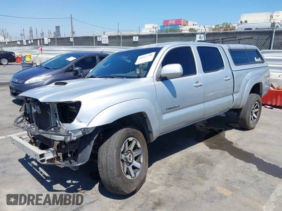 2005 Toyota Tacoma PreRunner with VIN 5TEKU72N65Z053095, listed as a IAAI auction lot 43017798 with 283,534 mi miles and . Bid and sale history available at DreamBid. Image 2.