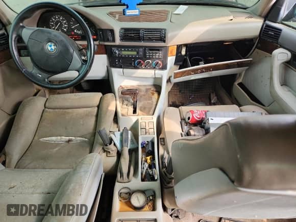 1995 BMW 5 Series с VIN WBAHE6323SGF32776, выставлен на аукционе Copart как лот 68162405 с пробегом 226 425 миль миль и Списание • Salvage title. История ставок и продаж доступна на DreamBid. Изображение 8.