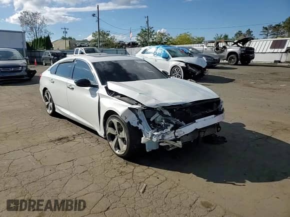 2018 Honda Accord Touring z VIN 1HGCV2F9XJA027462, wystawiony jako Copart lot #81780915 z przebiegiem Nie podano mil oraz Szkoda całkowita • Salvage title. Historia ofert i sprzedaży dostępna na DreamBid. Obrazek 13.