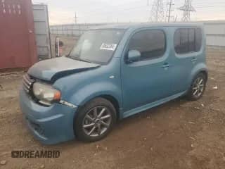 2011 Nissan Cube S Krom Edition с VIN JN8AZ2KR1BT202725, выставлен на аукционе Copart как лот 80632384 с пробегом 132 661 миль миль и Списание • Salvage title. История ставок и продаж доступна на DreamBid. Изображение 1.