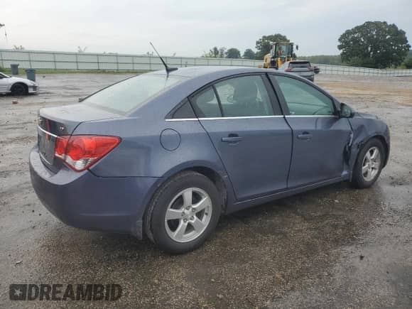 2013 Chevrolet Cruze 1LT z VIN 1G1PC5SBXD7284812, wystawiony jako Copart lot #70773015 z przebiegiem 58 165 mil mil oraz Czysty tytuł • Clean title. Historia ofert i sprzedaży dostępna na DreamBid. Obrazek 3.