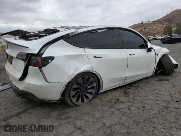 2022 Tesla Model Y Long Range with VIN 7SAYGAEE7NF465170, listed as a Copart auction lot 80191505 with 95,332 mi miles and Salvage title. Bid and sale history available at DreamBid. Image 3.