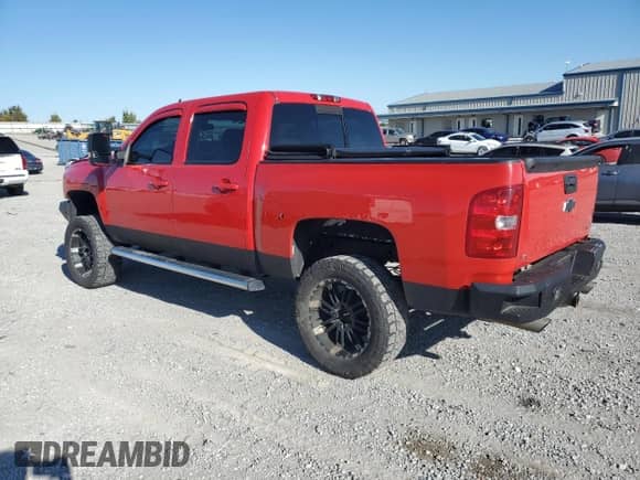 2009 Chevrolet Silverado 1500 LTZ with VIN 3GCEK33339G230826, listed as a Copart auction lot 71809015 with 198,069 mi miles and Salvage title. Bid and sale history available at DreamBid. Image 2.
