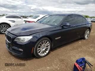 2014 BMW 7 Series ALPINA B7 with VIN WBAYE8C52ED135620, listed as a Copart auction lot 58221745 with 138,418 mi miles and Salvage title. Bid and sale history available at DreamBid. Image 1.