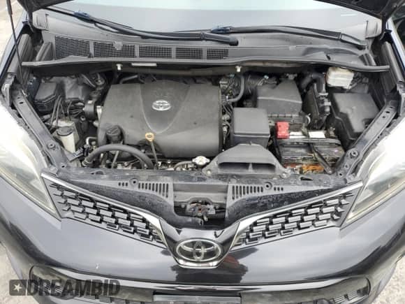 2019 Toyota Sienna SE with VIN 5TDXZ3DC7KS998173, listed as a Copart auction lot 82277075 with 182,512 mi miles and Salvage title. Bid and sale history available at DreamBid. Image 12.