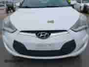 2017 Hyundai Veloster Value Edition z VIN KMHTC6AD7HU304774, wystawiony jako IAAI lot #42693195 z przebiegiem 102 427 mil mil oraz . Historia ofert i sprzedaży dostępna na DreamBid. Obrazek 6.