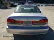 2002 Honda Accord EX with VIN 1HGCG16582A075738, listed as a Copart auction lot 42964715 with 276,765 mi miles and Salvage title. Bid and sale history available at DreamBid. Image 6.