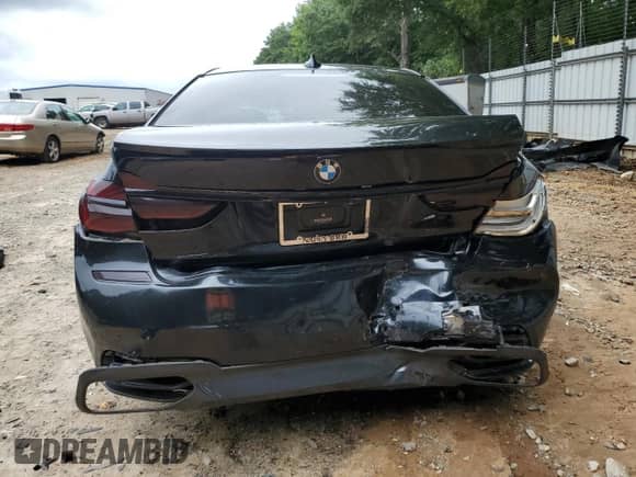 2019 BMW 7 Series 740i z VIN WBA7E2C5XKB217949, wystawiony jako Copart lot #69953435 z przebiegiem Nie podano mil oraz Szkoda całkowita • Salvage title. Historia ofert i sprzedaży dostępna na DreamBid. Obrazek 6.