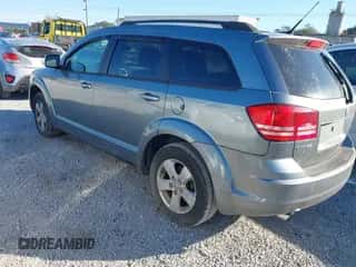 2010 Dodge Journey SXT with VIN 3D4PG5FVXAT148013, listed as a IAAI auction lot 43487466 with 109,732 mi miles and . Bid and sale history available at DreamBid. Image 3.