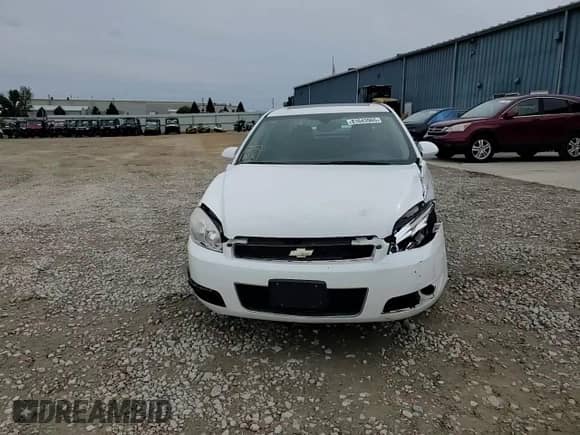 2012 Chevrolet Impala LTZ with VIN 2G1WC5E30C1221083, listed as a Copart auction lot 81643965 with 153,674 mi miles and Salvage title. Bid and sale history available at DreamBid. Image 13.
