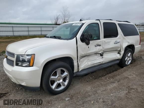 2012 Chevrolet Suburban LTZ z VIN 1GNSCKE02CR199645, wystawiony jako Copart lot #47209145 z przebiegiem 128 454 mil mil oraz Szkoda całkowita • Salvage title. Historia ofert i sprzedaży dostępna na DreamBid. Obrazek 1.