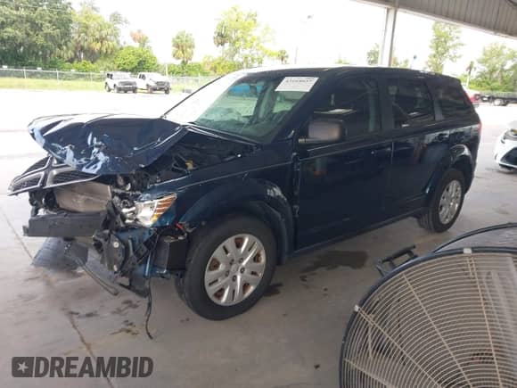 2015 Dodge Journey American Value z VIN 3C4PDCAB8FT597916, wystawiony jako IAAI lot #43164037 z przebiegiem 134 185 mil mil oraz . Historia ofert i sprzedaży dostępna na DreamBid. Obrazek 18.