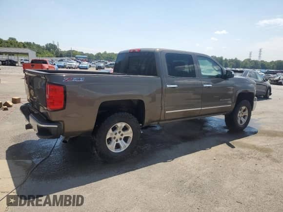 2014 Chevrolet Silverado 1500 LTZ с VIN 3GCUKSEC1EG270609, выставлен на аукционе Copart как лот 68536075 с пробегом 227 857 миль миль и Списание • Salvage title. История ставок и продаж доступна на DreamBid. Изображение 3.