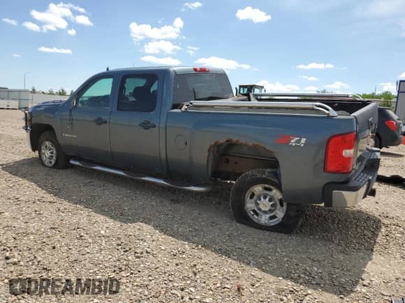 2009 Chevrolet Silverado 2500HD LT с VIN 1GCHK53K99F120607, выставлен на аукционе Copart как лот 58598345 с пробегом 166 036 миль миль и Списание • Salvage title. История ставок и продаж доступна на DreamBid. Изображение 2.