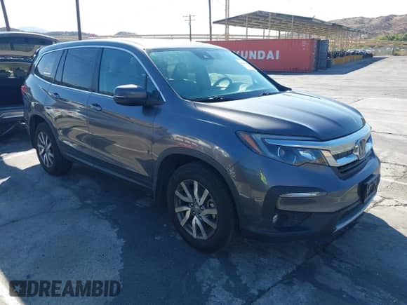 2021 Honda Pilot EX-L z VIN 5FNYF5H5XMB014493, wystawiony jako IAAI lot #43334999 z przebiegiem 178 052 mil mil oraz . Historia ofert i sprzedaży dostępna na DreamBid. Obrazek 1.