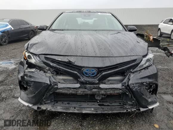2023 Toyota Camry Hybrid XSE с VIN 4T1K31AK0PU614339, выставлен на аукционе Copart как лот 68635715 с пробегом 87 939 миль миль и Списание • Salvage title. История ставок и продаж доступна на DreamBid. Изображение 5.