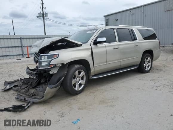 2016 Chevrolet Suburban LTZ z VIN 1GNSCJKCXGR215959, wystawiony jako Copart lot #41459895 z przebiegiem Nie podano mil oraz Szkoda całkowita • Salvage title. Historia ofert i sprzedaży dostępna na DreamBid. Obrazek 1.