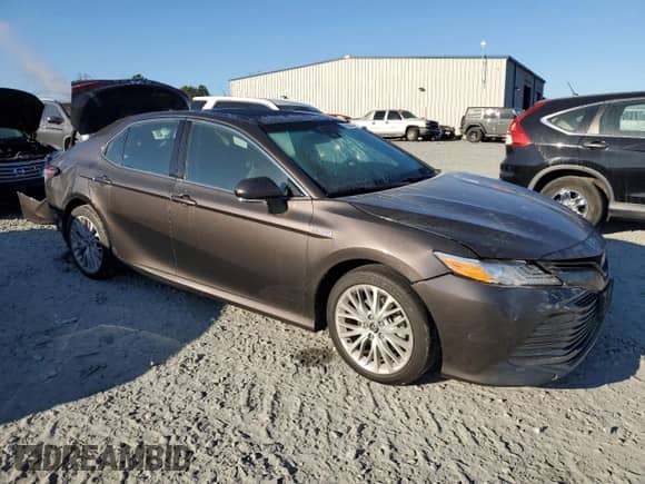 2020 Toyota Camry Hybrid XLE with VIN 4T1F31AK7LU525329, listed as a Copart auction lot 75832114 with 76,763 mi miles and Salvage title. Bid and sale history available at DreamBid. Image 4.