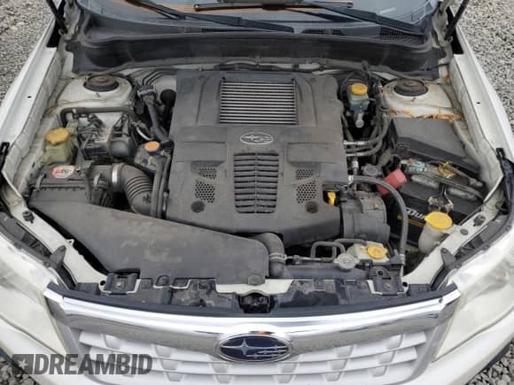 2013 Subaru Forester XT Touring с VIN JF2SHGGC6DH434166, выставлен на аукционе Copart как лот 82132484 с пробегом 174 442 миль миль и Списание • Salvage title. История ставок и продаж доступна на DreamBid. Изображение 11.