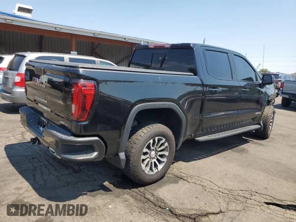 2022 GMC Sierra 1500 AT4 with VIN 1GTP9EEL1NZ233974, listed as a Copart auction lot 68958775 with 100,439 mi miles and Salvage title. Bid and sale history available at DreamBid. Image 3.