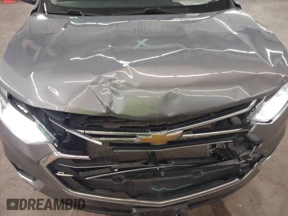 2020 Chevrolet Traverse LT with VIN 1GNEVHKW4LJ256719, listed as a IAAI auction lot 42629566 with 110,357 mi miles and . Bid and sale history available at DreamBid. Image 6.