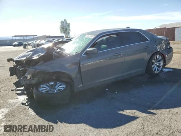 2017 Chrysler 300 Limited with VIN 2C3CCAAG5HH668040, listed as a Copart auction lot 57256155 with 134,784 mi miles and Salvage title. Bid and sale history available at DreamBid. Image 1.