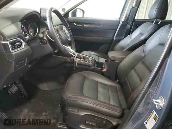 2024 Mazda CX-5 S Carbon Edition z VIN JM3KFBCL4R0467340, wystawiony jako Copart lot #70277925 z przebiegiem 15 036 mil mil oraz Szkoda całkowita • Salvage title. Historia ofert i sprzedaży dostępna na DreamBid. Obrazek 7.