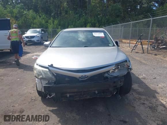 2014 Toyota Camry L with VIN 4T1BF1FK5EU857092, listed as a IAAI auction lot 43274875 with 151,925 mi miles and . Bid and sale history available at DreamBid. Image 12.