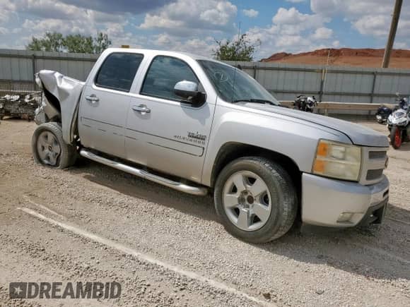 2011 Chevrolet Silverado 1500 LT with VIN 3GCPCSE07BG403854, listed as a Copart auction lot 80082875 with 185,595 mi miles and Salvage title. Bid and sale history available at DreamBid. Image 4.