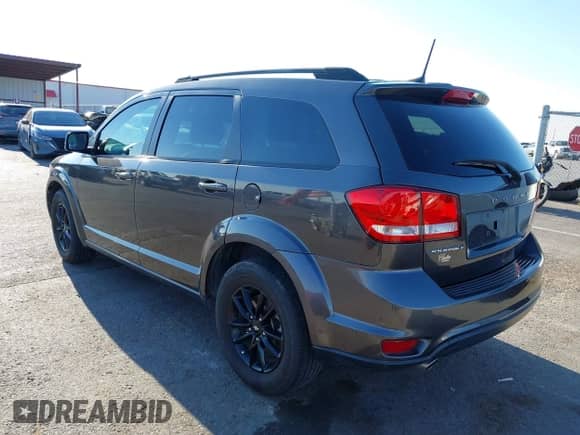 2019 Dodge Journey SE with VIN 3C4PDCBG9KT853193, listed as a IAAI auction lot 42937842 with 98,538 mi miles and . Bid and sale history available at DreamBid. Image 3.