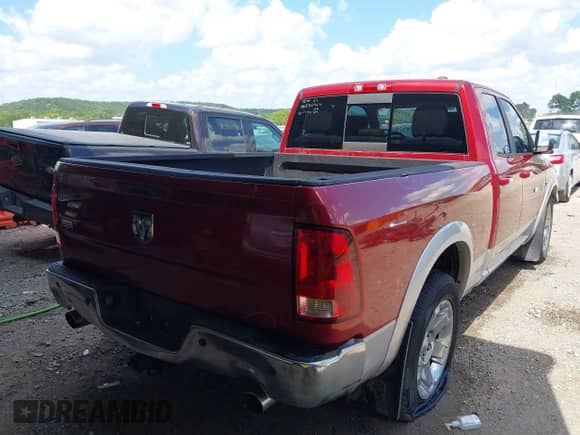 2012 Ram 1500 with VIN 1C6RD6JT5CS255685, listed as a IAAI auction lot 42714644 with 125,953 mi miles and . Bid and sale history available at DreamBid. Image 4.