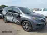 2016 Honda Pilot EX-L with VIN 5FNYF6H57GB015918, listed as a IAAI auction lot 43267717 with 155,812 mi miles and . Bid and sale history available at DreamBid. Image 1.