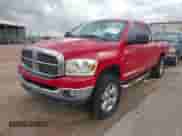2007 Dodge 1500 SLT with VIN 1D7HU18257S252432, listed as a IAAI auction lot 43077259 with 228,891 mi miles and . Bid and sale history available at DreamBid. Image 2.